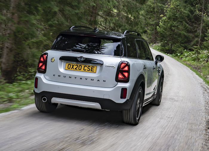 Mini Countryman PHEV exterior rear driving in forest